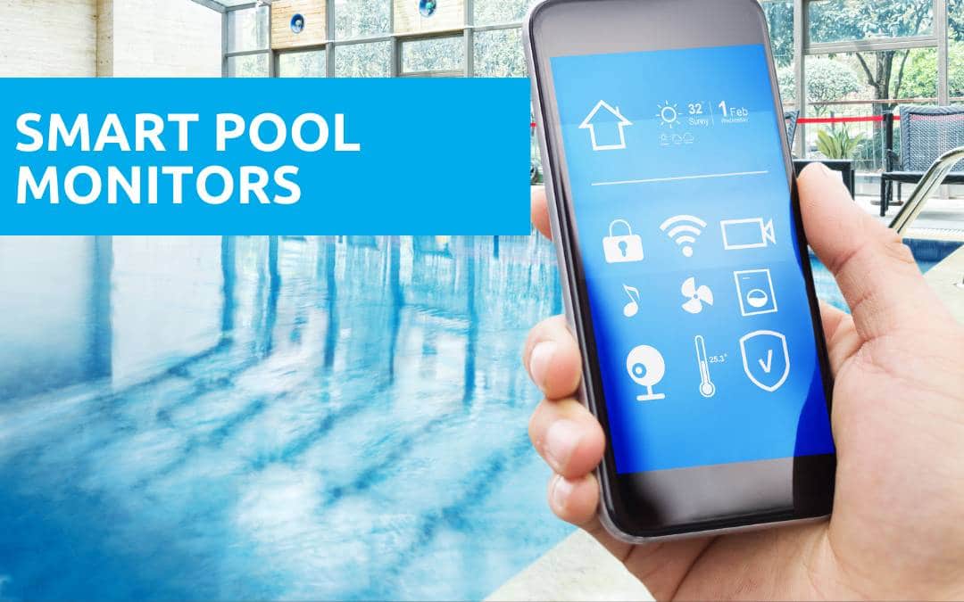 A hand holds a smartphone displaying smart pool monitors controls next to an indoor swimming pool; text reads "Smart Pool Monitors.