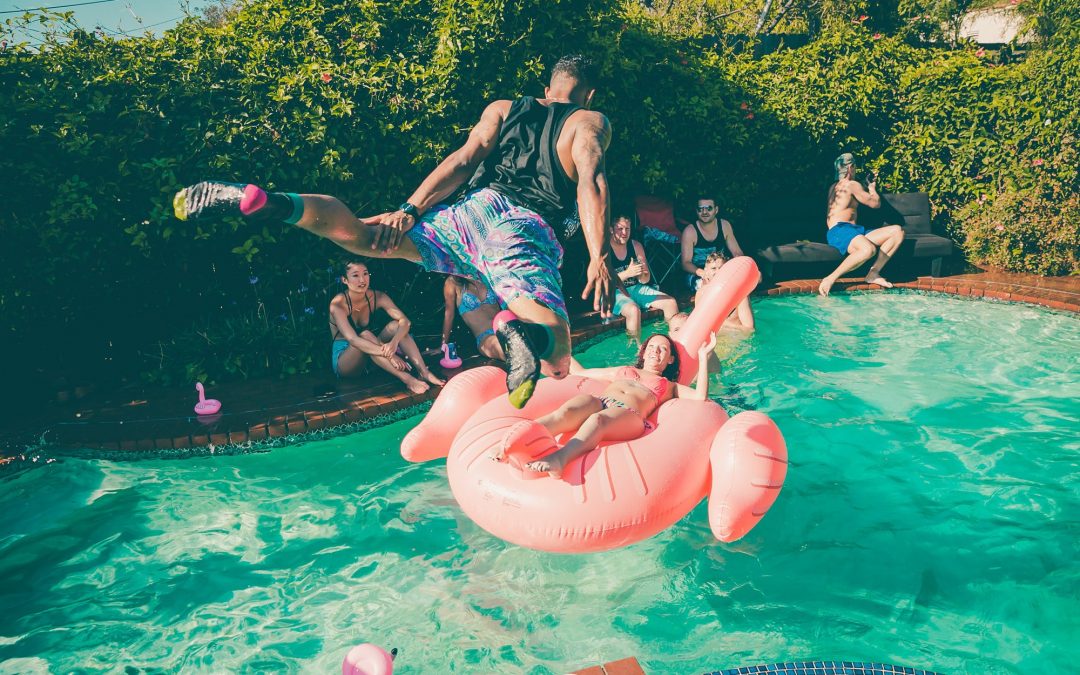 A Man Diving Into A Pool At A Party A7639bf80834409cdab4824059fee66c 2000How to Plan an Amazing Fourth of July Pool Party